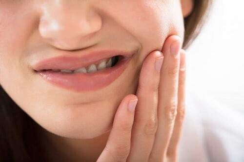 Nguyên nhân khiến răng trở nên nhạy cảm-1